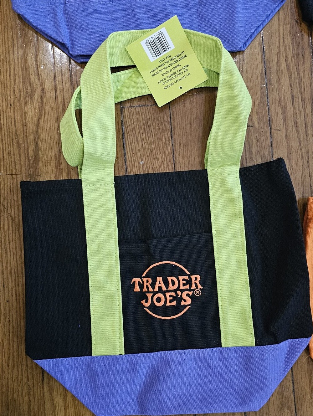 Trader Joe's Black Canvas Tote with Lime Handles and Purple Base